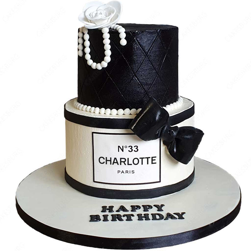 Premium Photo | Black cake on the light background with golden decoration  luxurious birthday cake