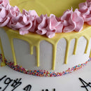 Yellow Buttercream Cake with Rainbow Sprinkles