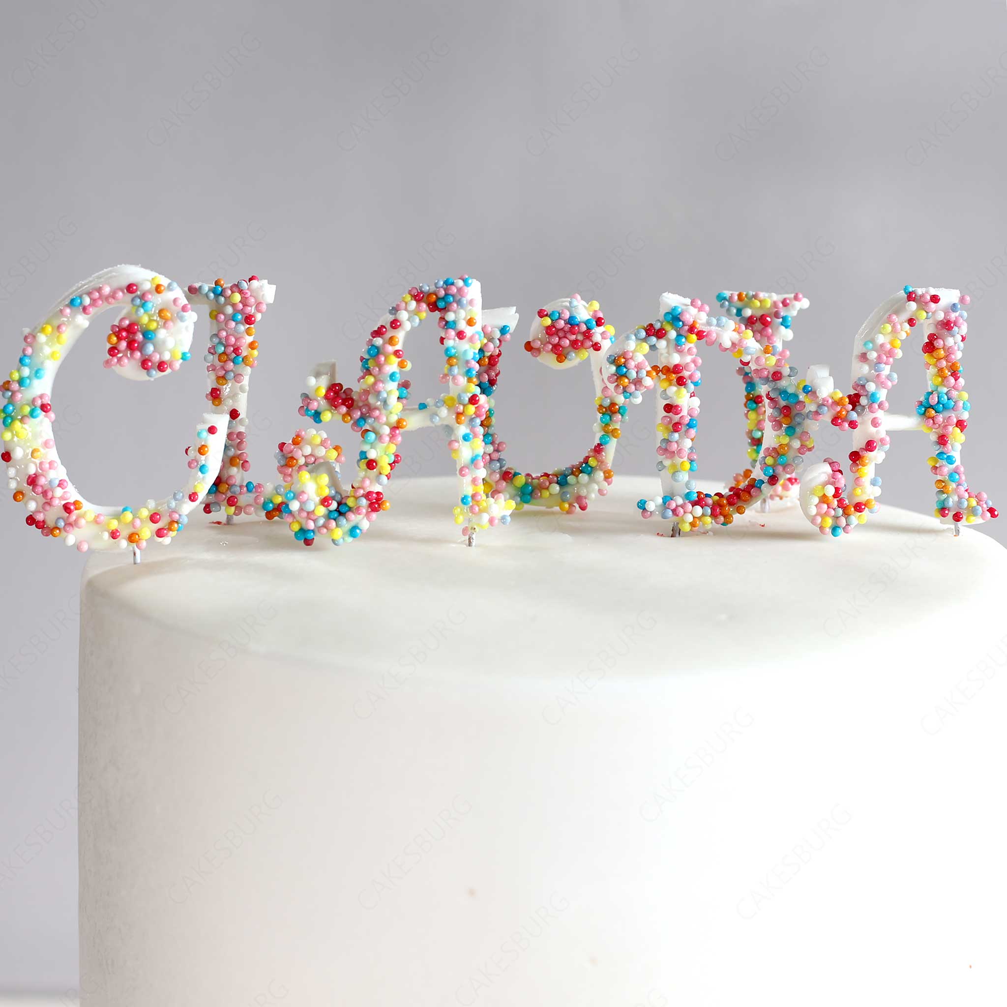 Elegant Ribbon Sprinkles Cake