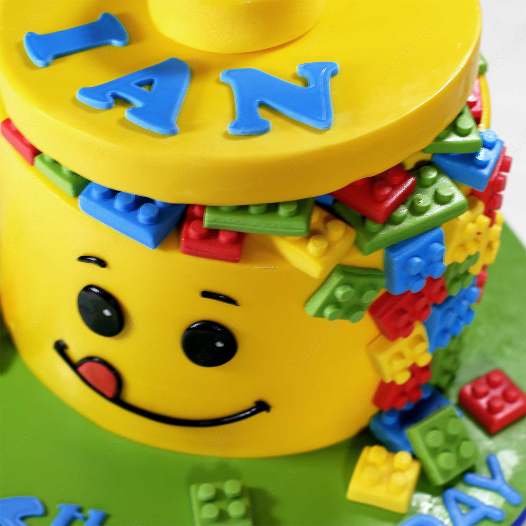 Lego head Cake - Decorated Cake by The Sweetery - by - CakesDecor