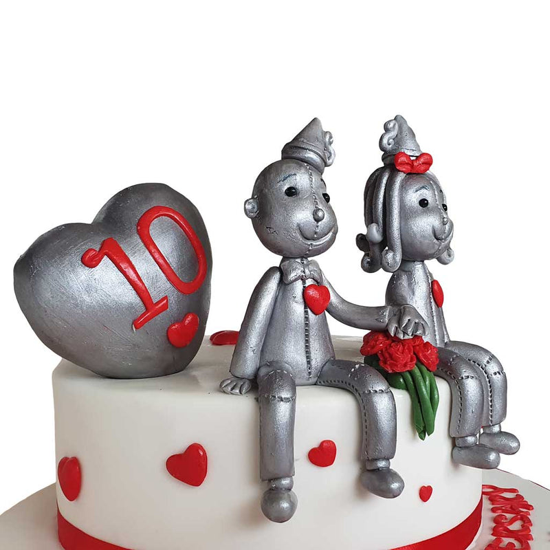 10th Anniversary Tin Figurines Cake